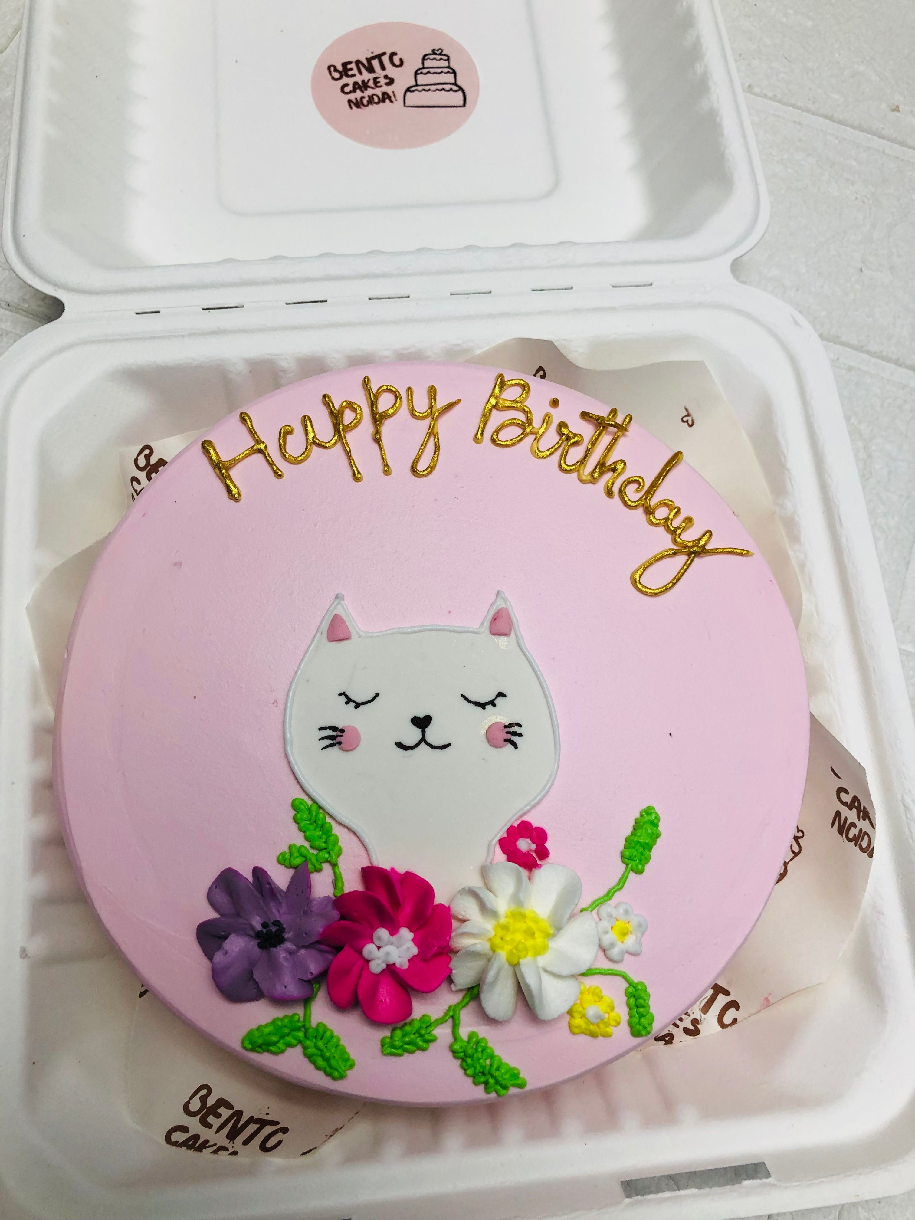 Pink Frosted with White Cat cake