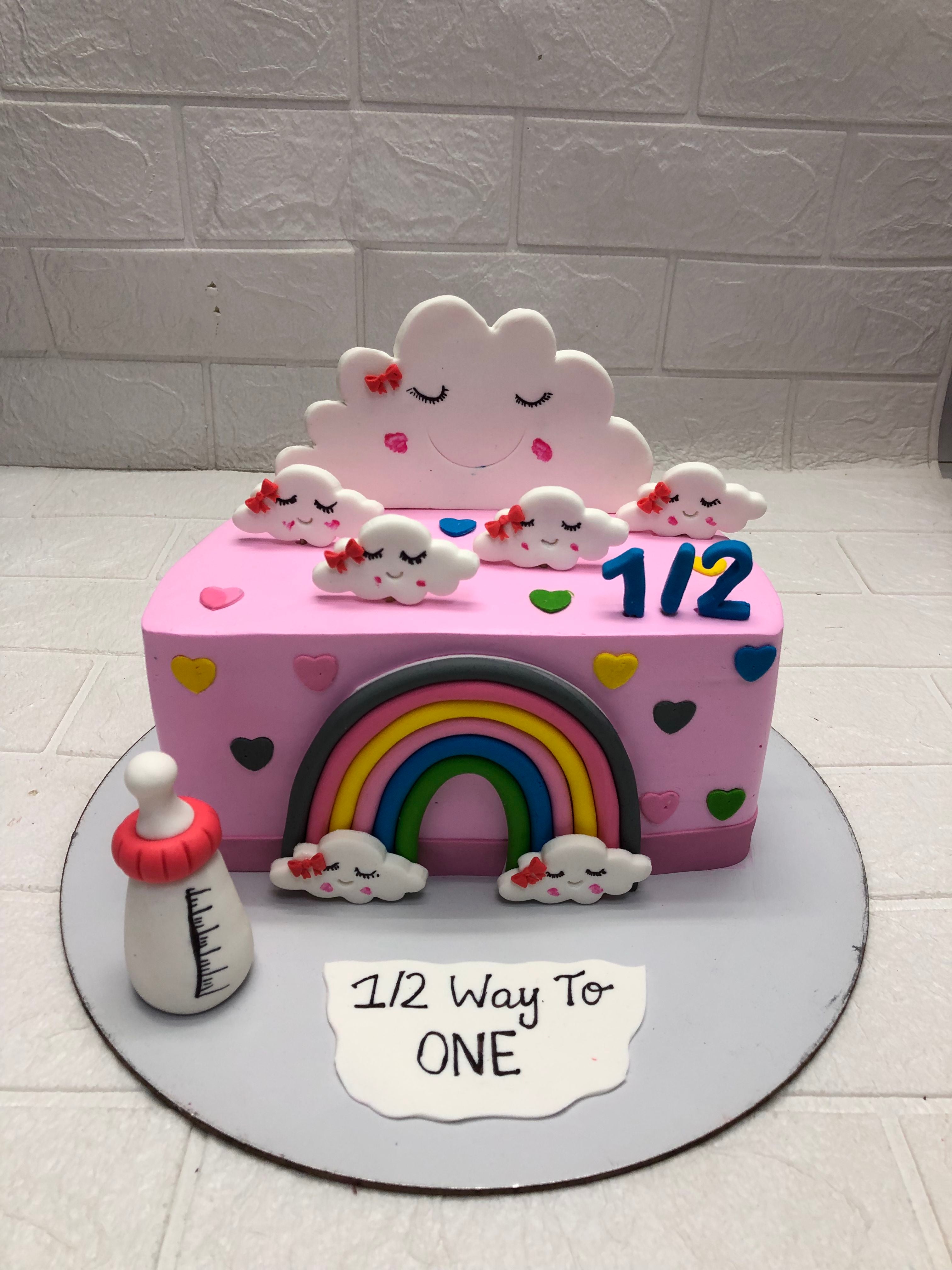 Pink Fondant with Clouds cake