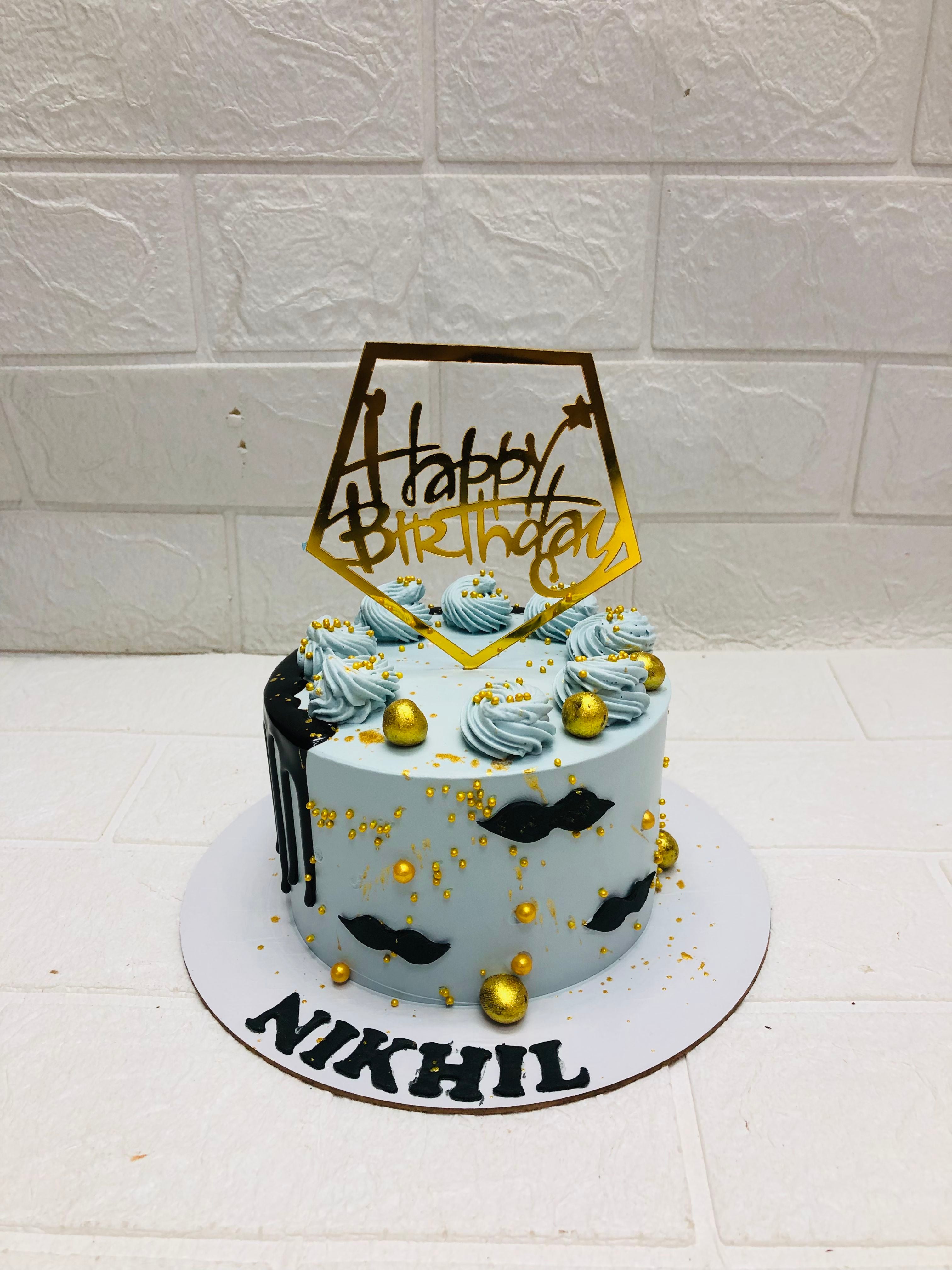 Blue Swirl with Mustache Decor cake