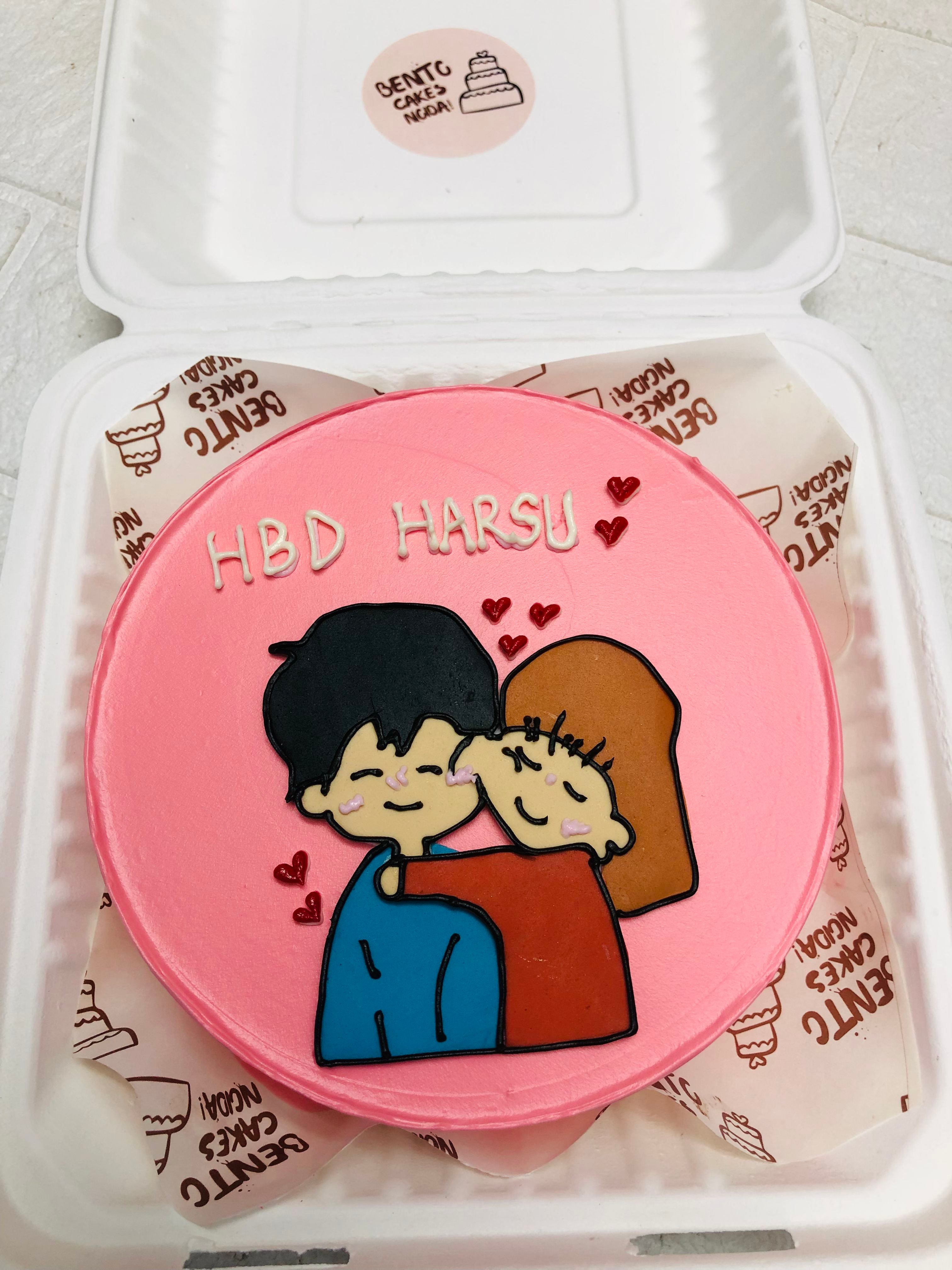 Pink Frosted Cartoon Couple cake