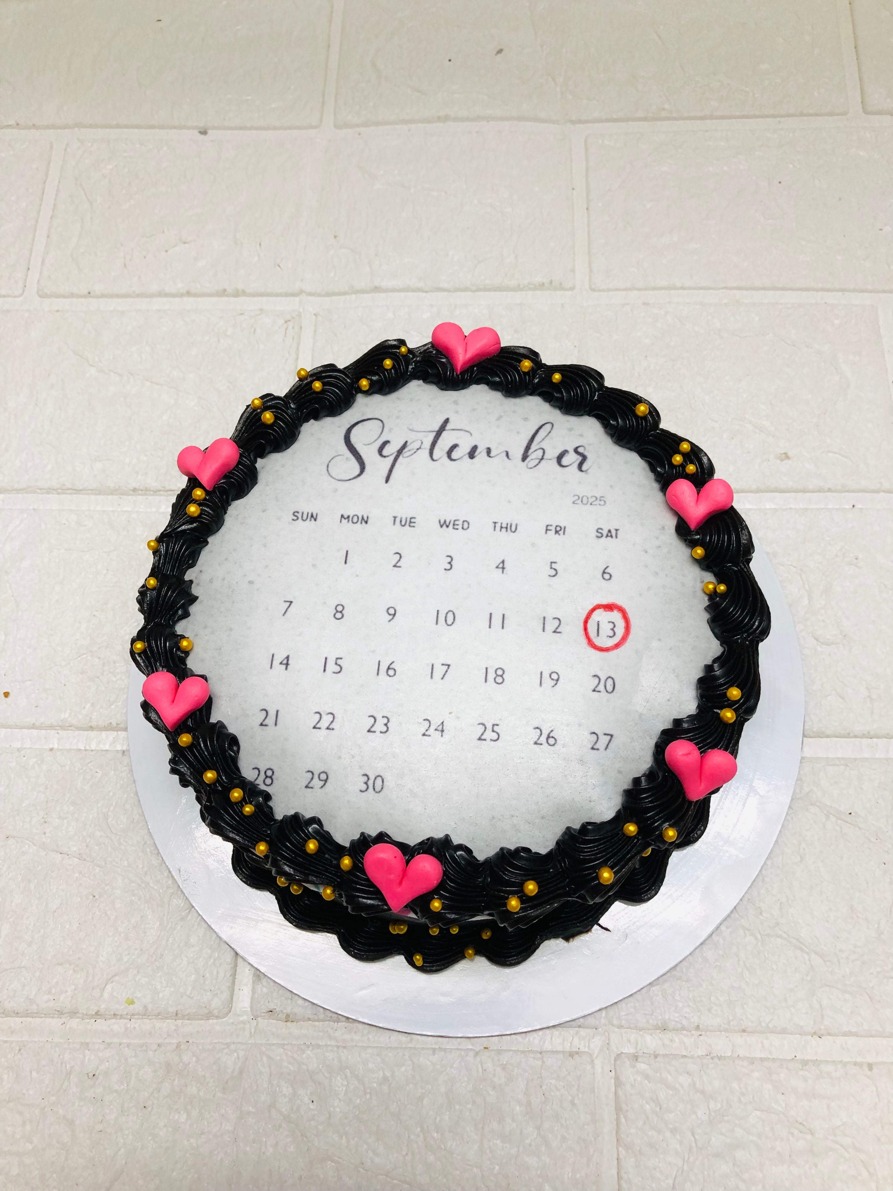 Black Frosting with Pink Hearts calender cake