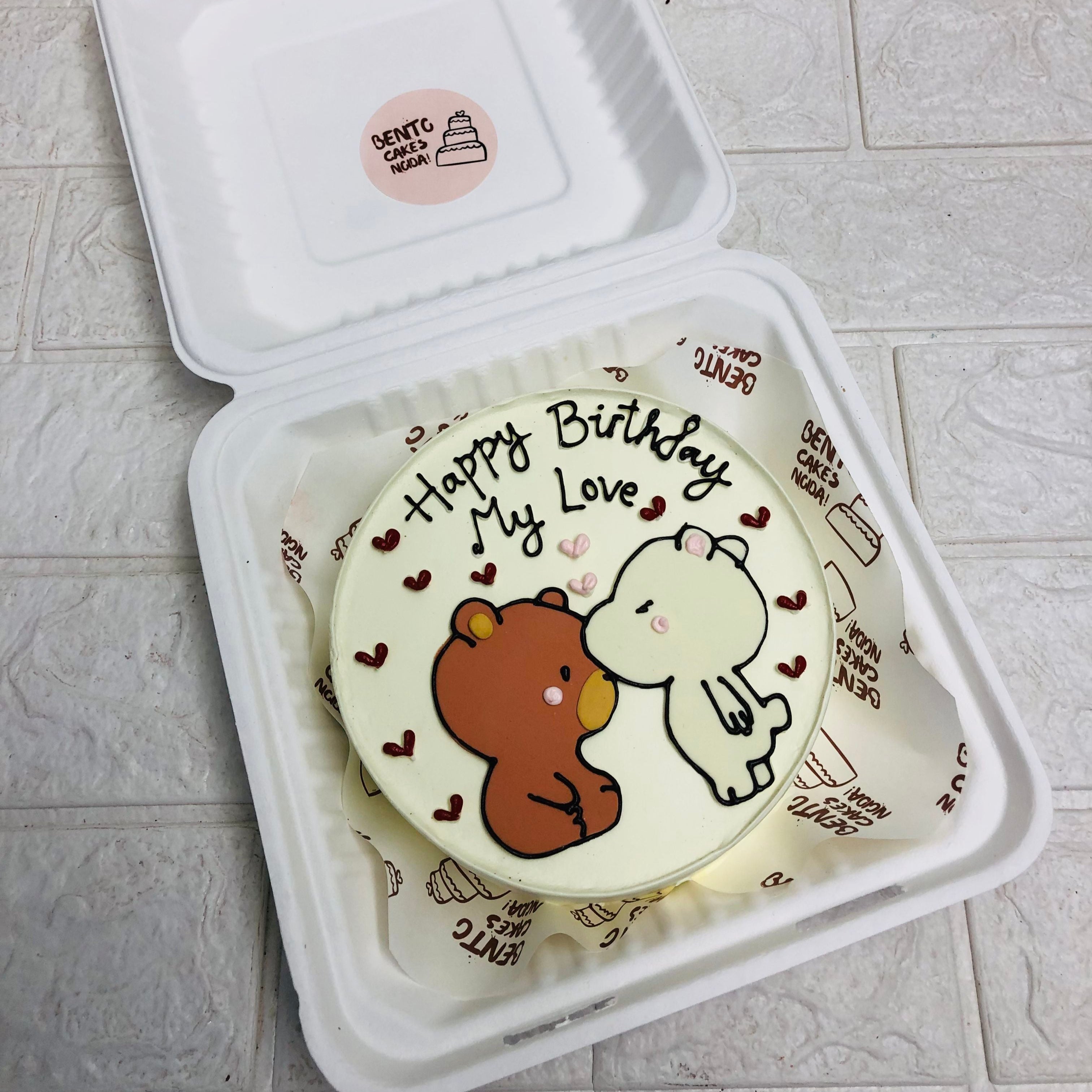 A delightful cake featuring a cute Bubu and Dudu sticker, perfect for celebrations and sweet moments.