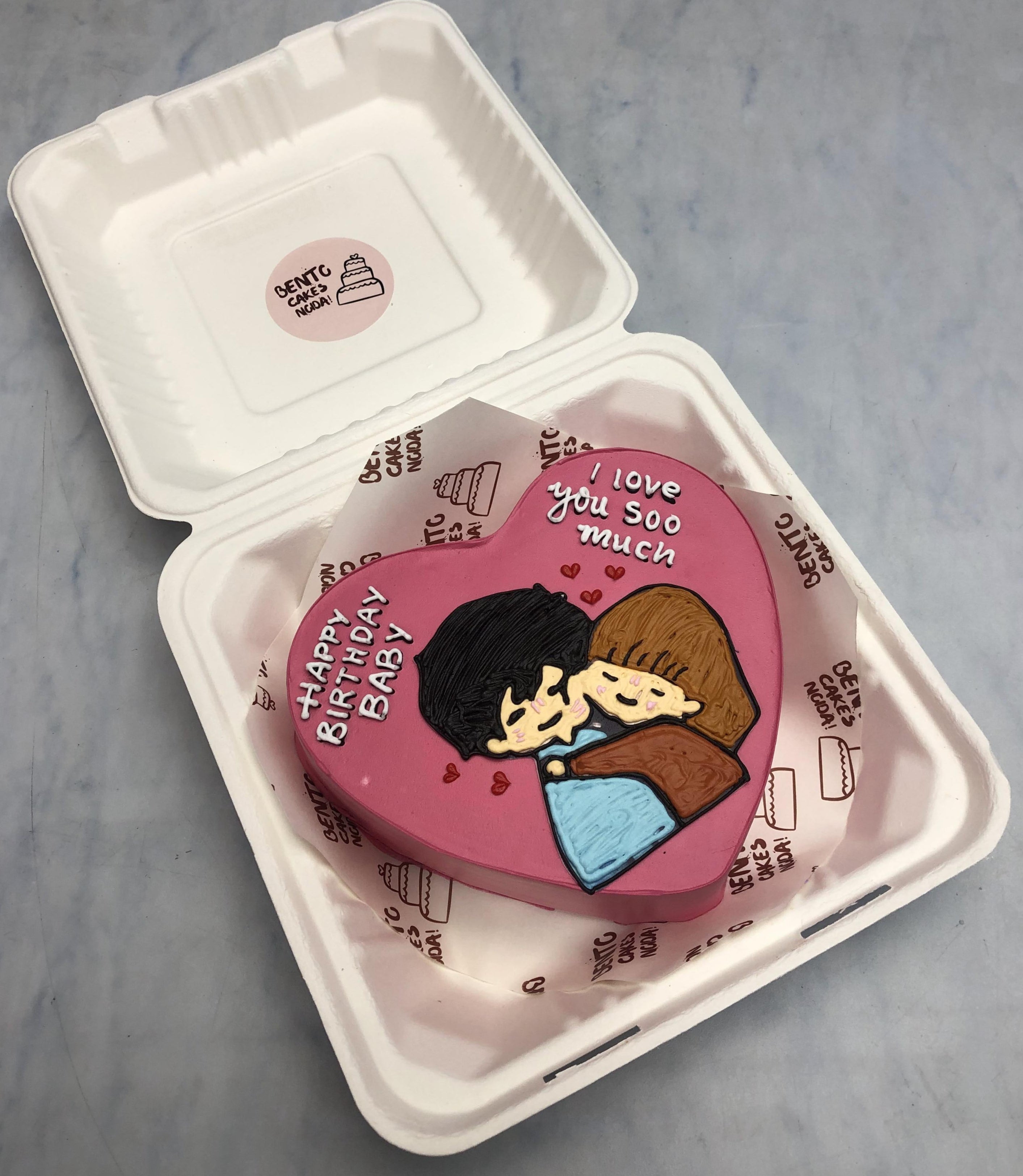 A Love Couple Heart shape bento cake with loving text on it.