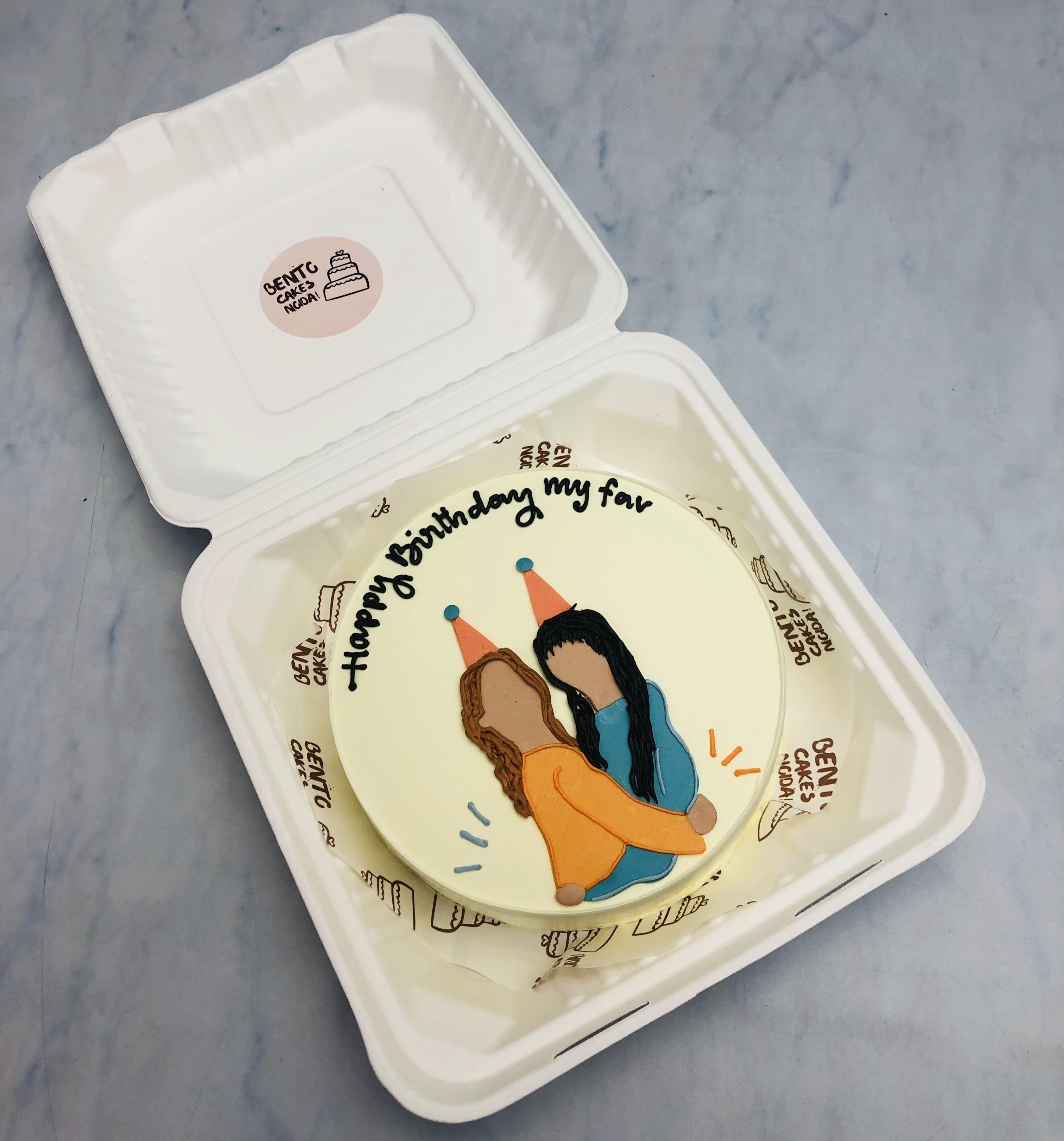A offwhite bento cake showing tow best friends celebrating others birthday and hugging each other.