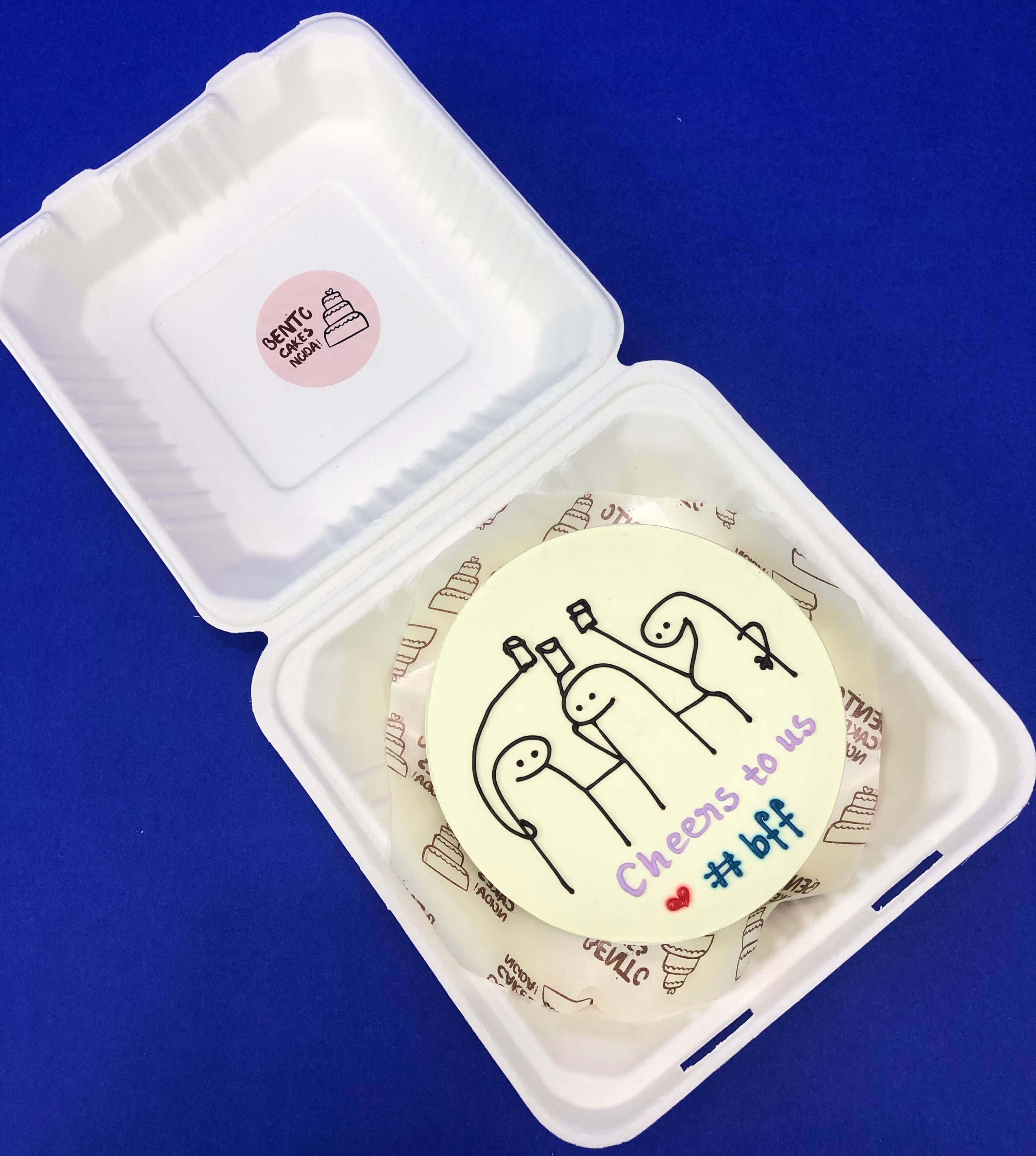 A white bento cake having mimi friends celebrating friendship moment together.