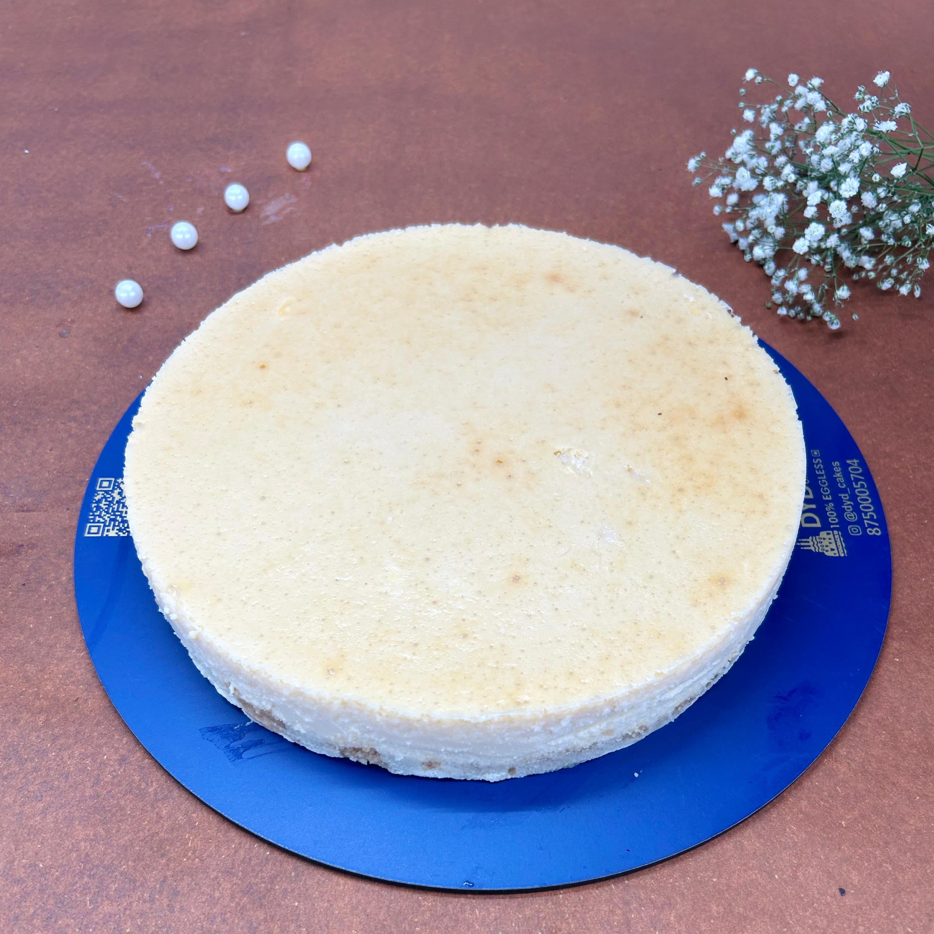 Indulge in a creamy and decadent slice of classic New York cheesecake, a dessert that will satisfy your sweet tooth cravings.