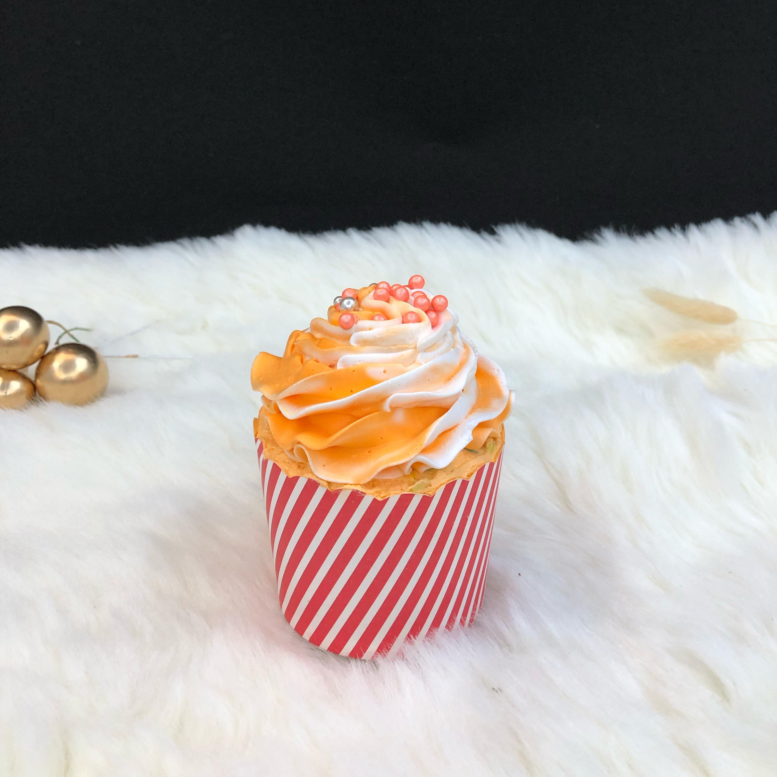 A cup filled with Orange flavour.