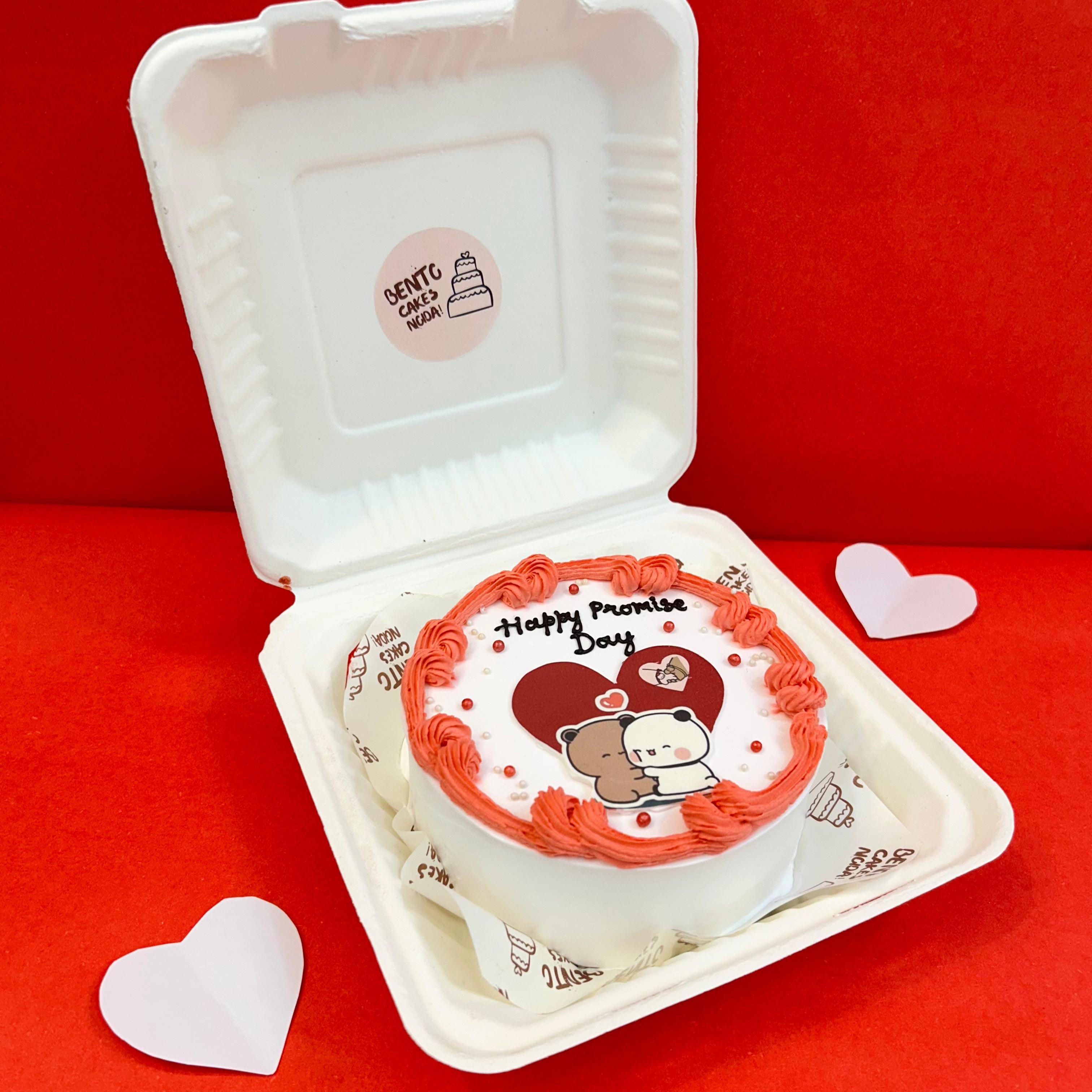 Promise Day cake with a round design in a bento box with side view, accompanied by the Bubu Dudu cartoon character.