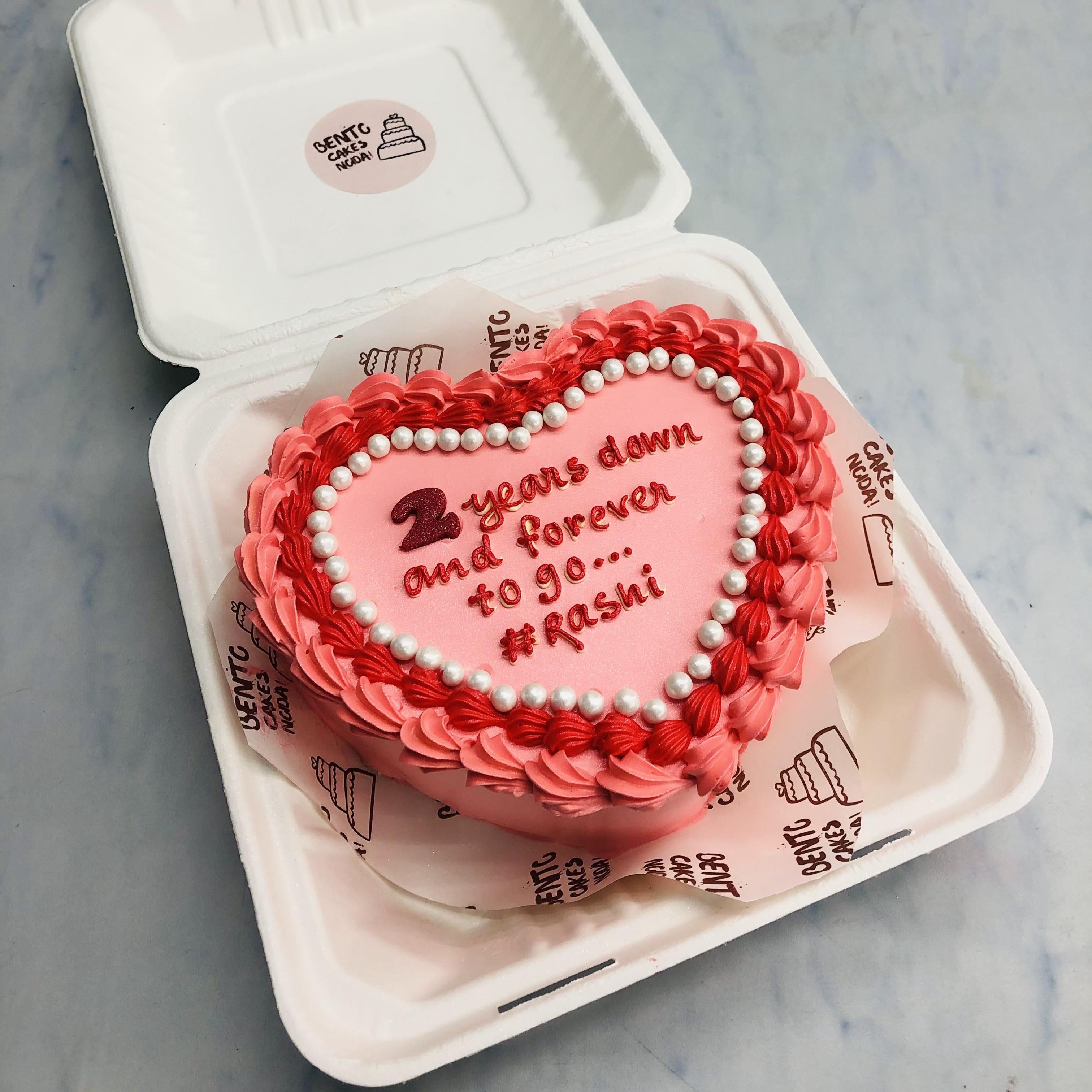 Red-Pink Heart Shape Anniversary bento cake with white sprinkles.
