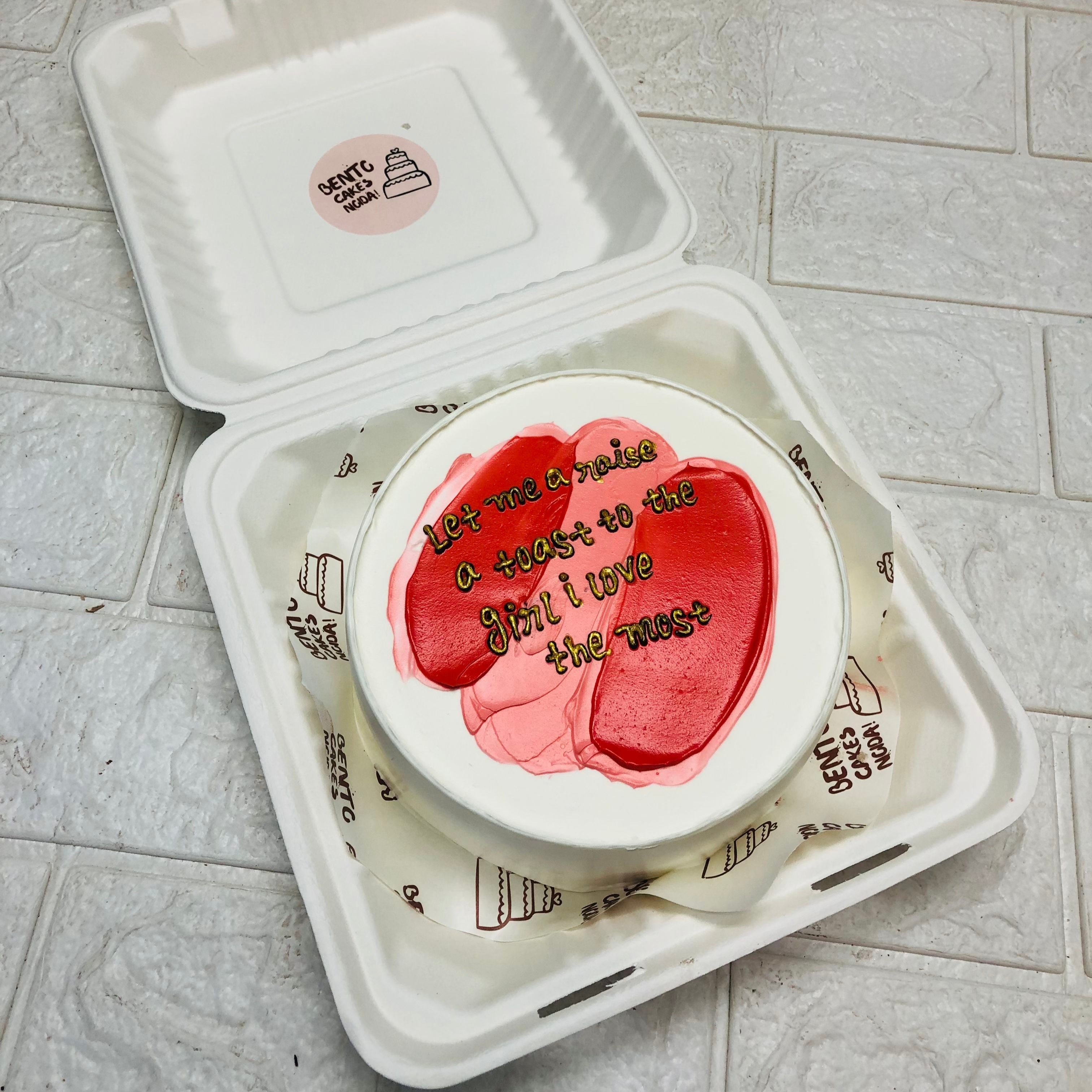 A cake adorned with red shades, showcasing a unique and playful design for a special celebration.