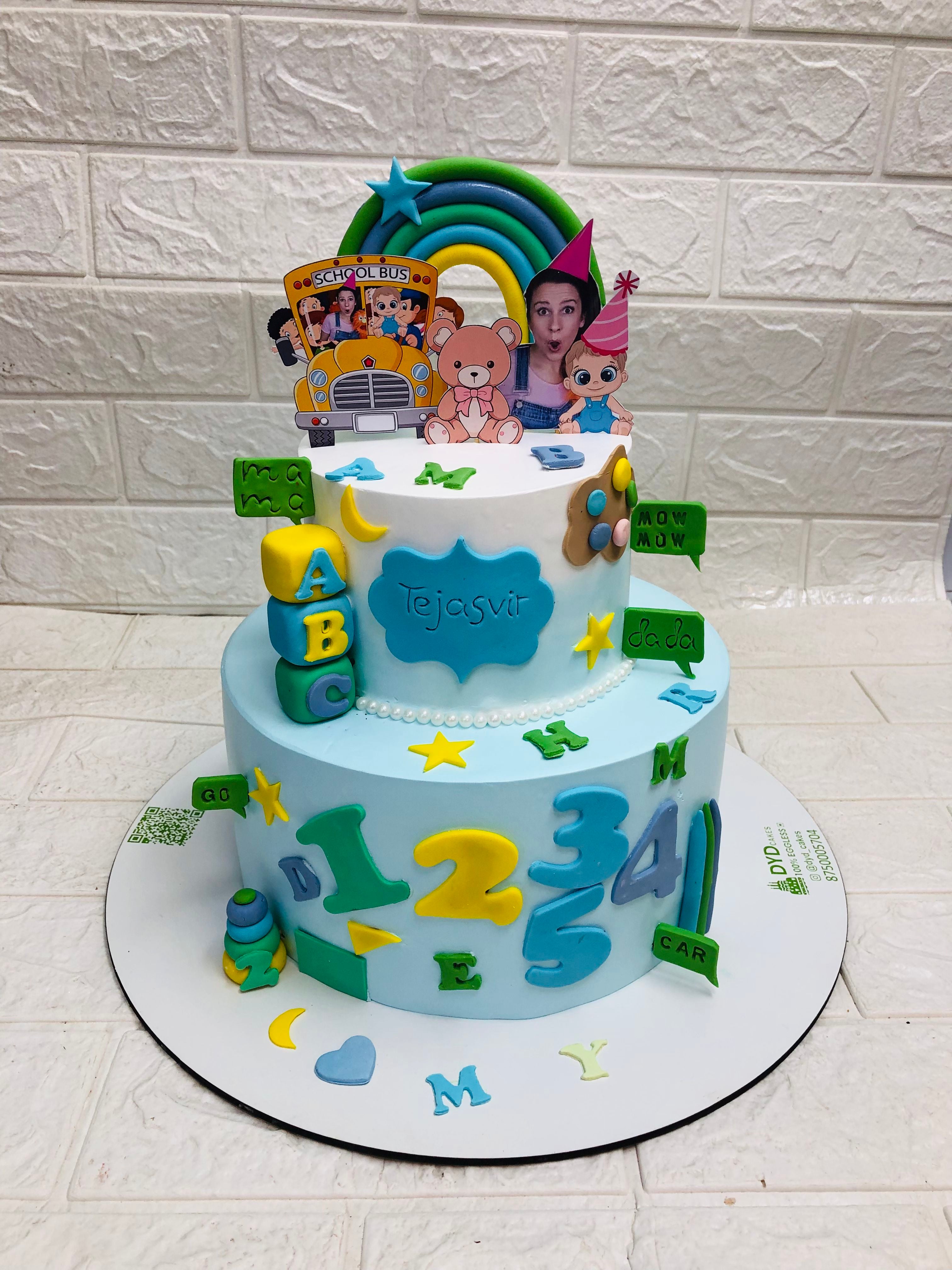 A beautifully placed cake adorned with a cheerful cartoon character, perfect for any festive occasion.