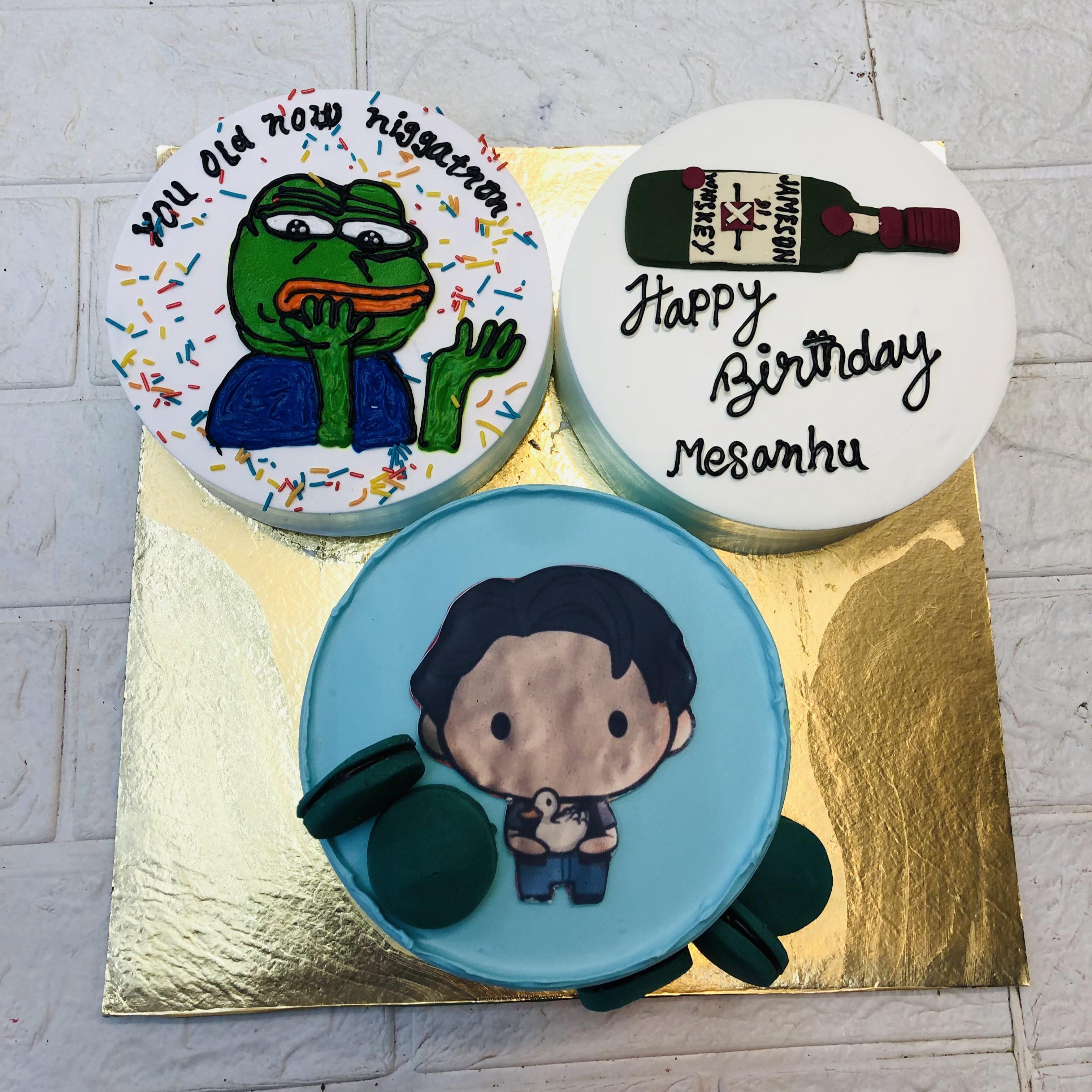 A set of 3 bento cakes having different theme and color.