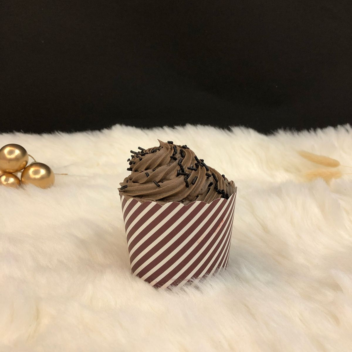 A cup filled with soft truffle flaour.