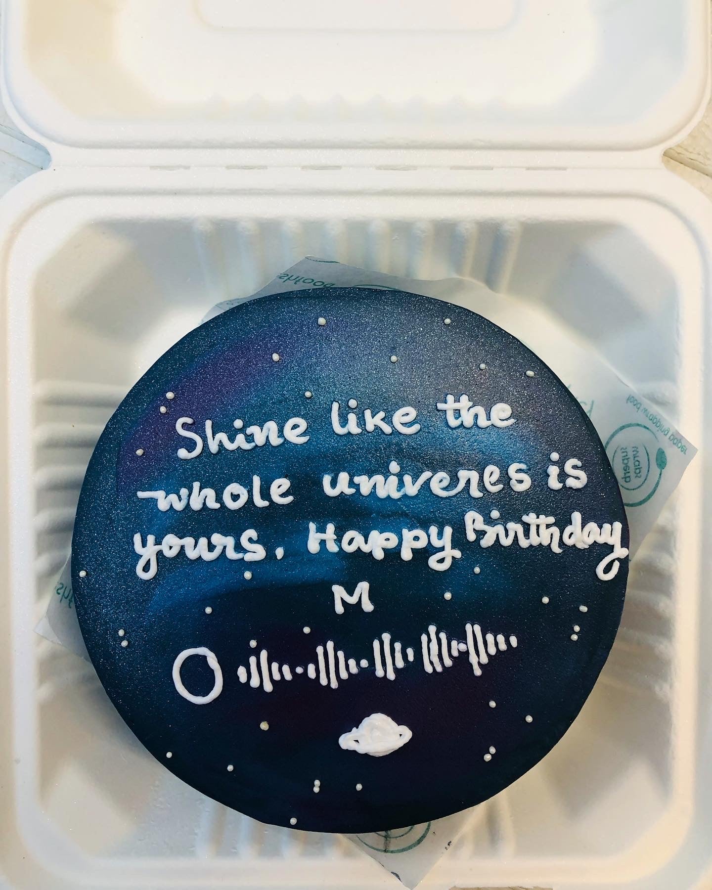 A colorful birthday cake adorned with a heartfelt quote, celebrating a special occasion with joy and sweetness and its 100% eggless.