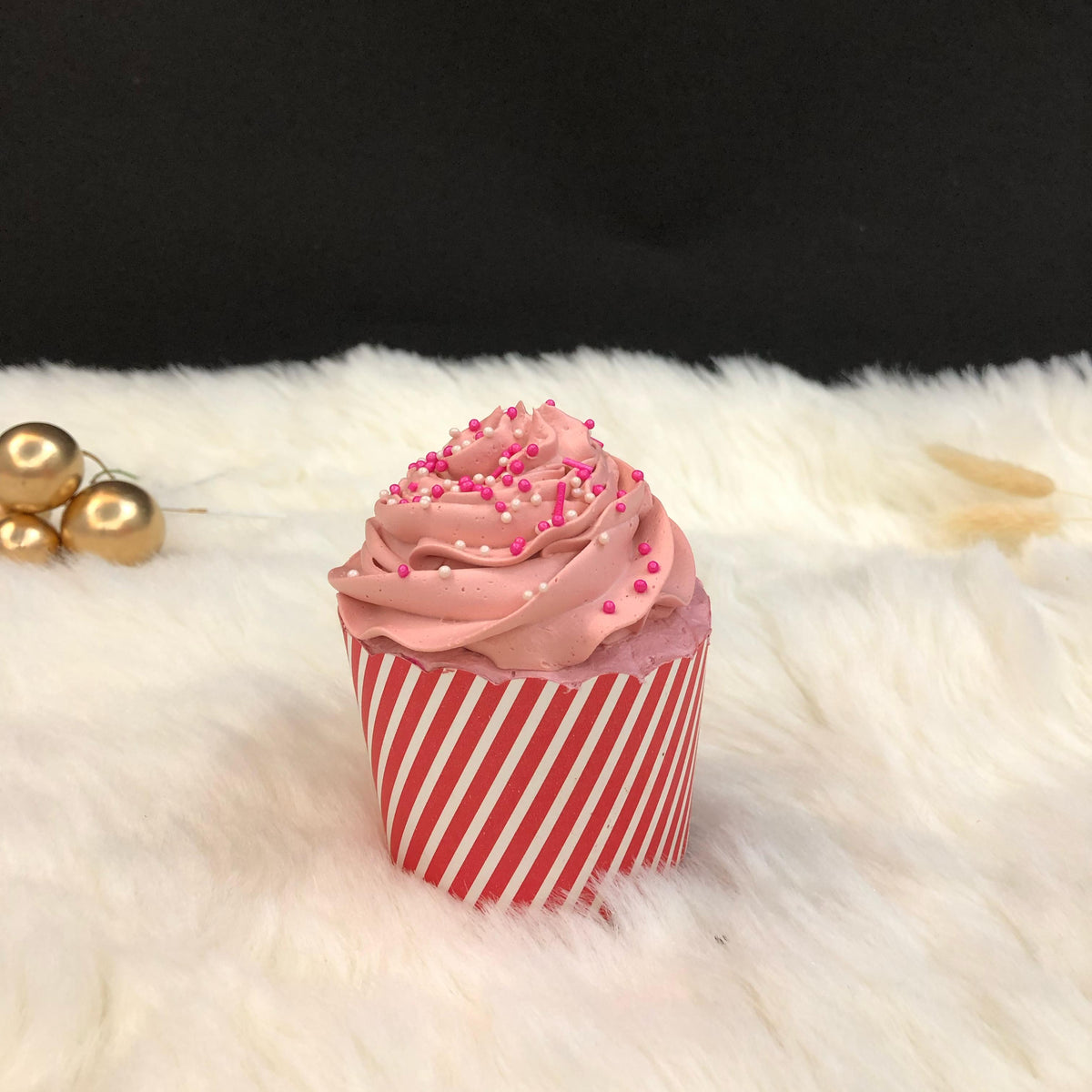 A cup fillaed with strawberry flavour.