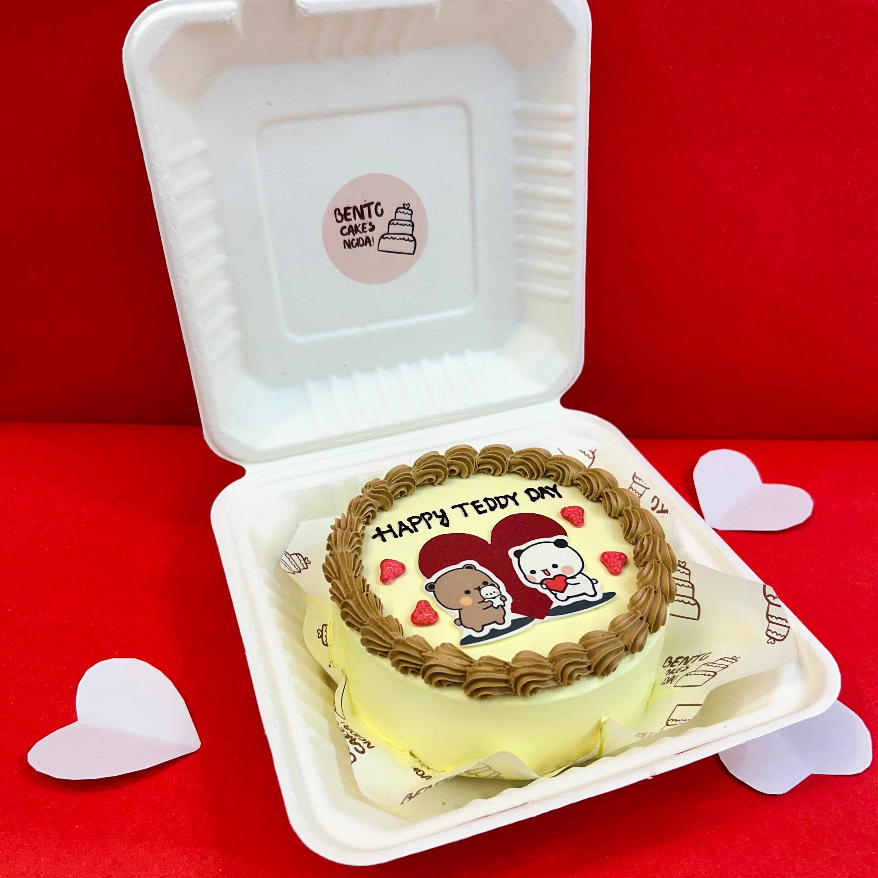 A cake adorned with a teddy bear and a heart, featuring the Bubu Dudu cartoon character for Teddy Day celebration with side view.
