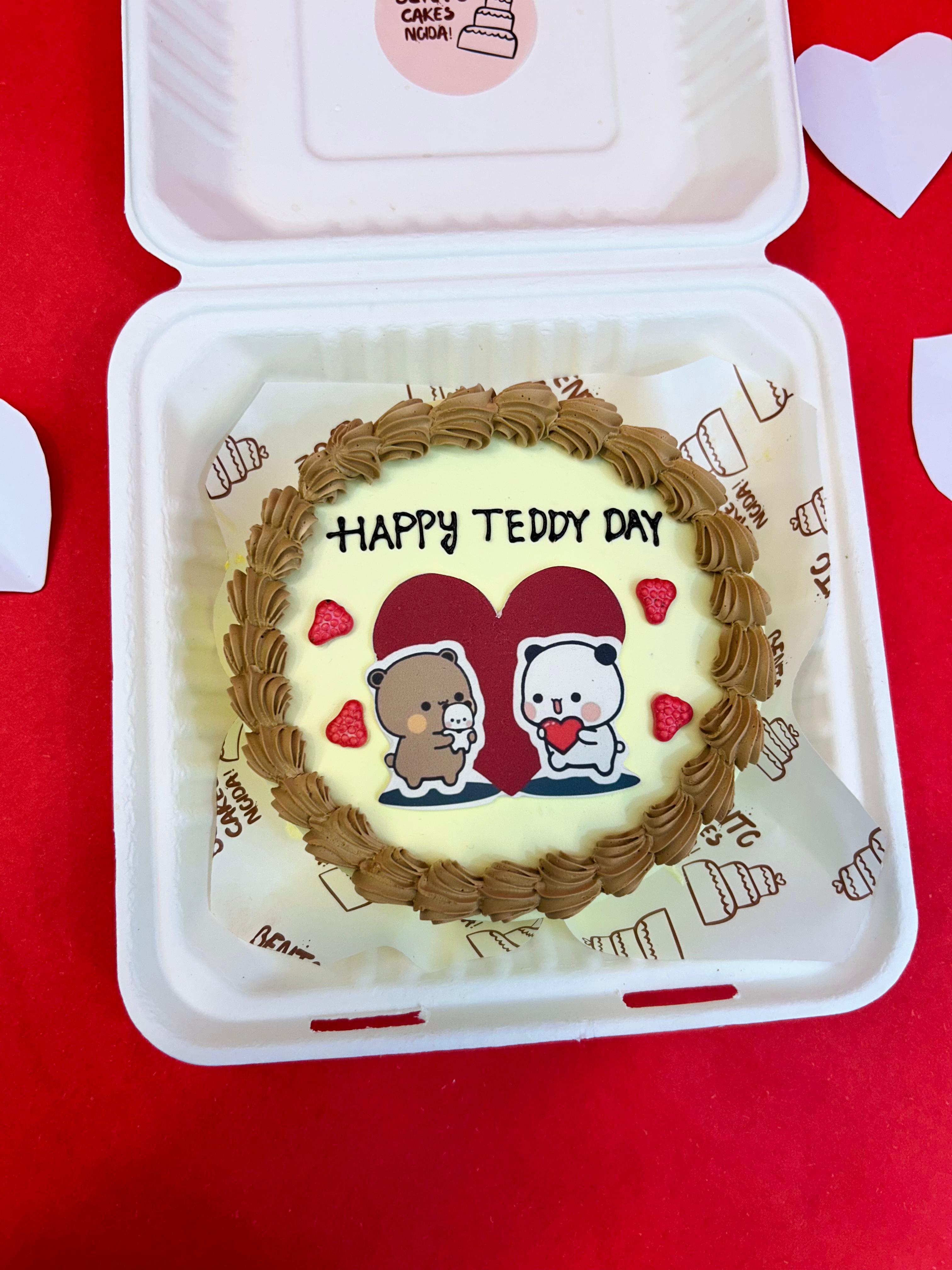 A cake adorned with a teddy bear and a heart, featuring the Bubu Dudu cartoon character for Teddy Day celebration with front view.