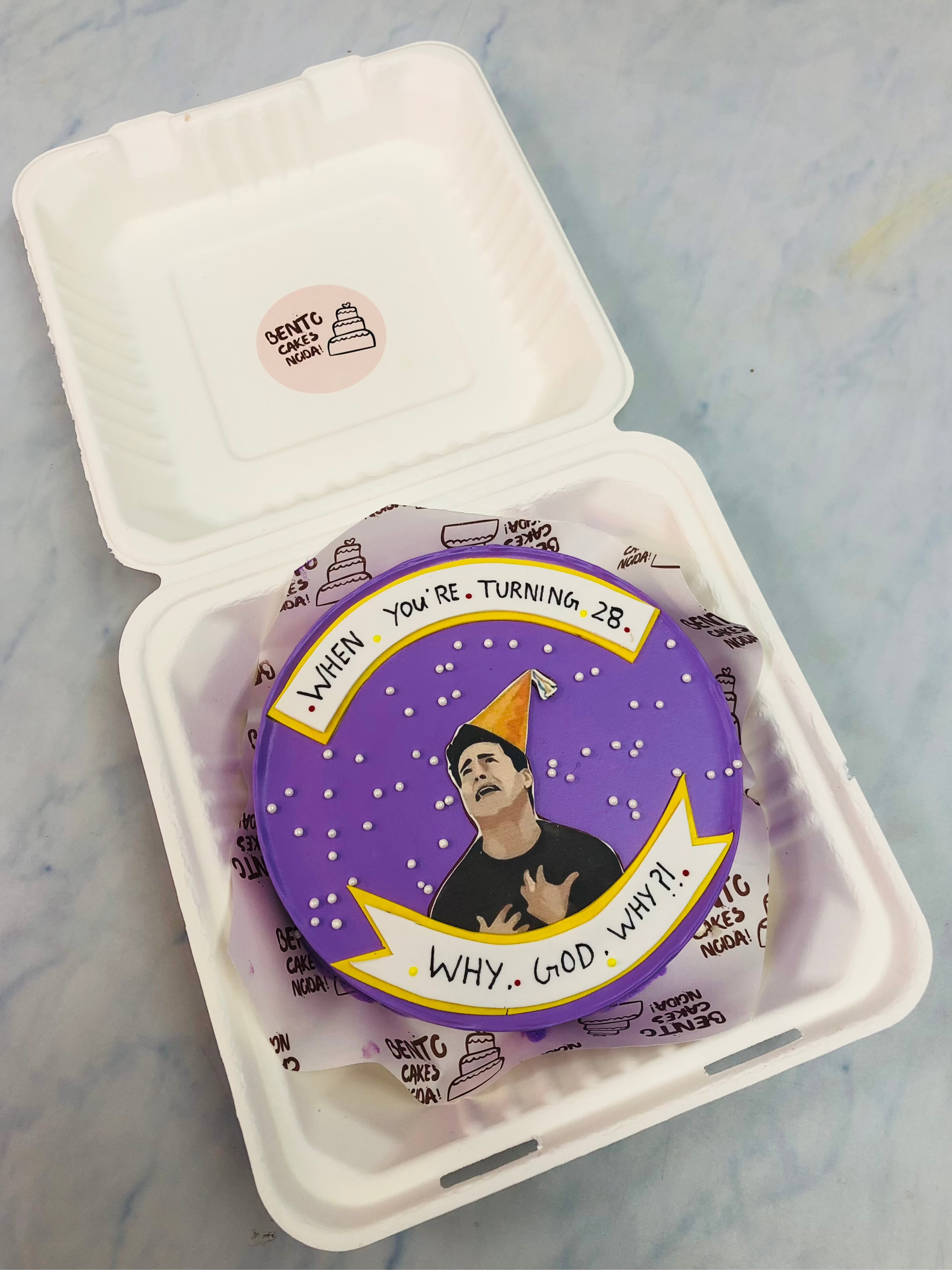 A blue bento cake with friends series character print.