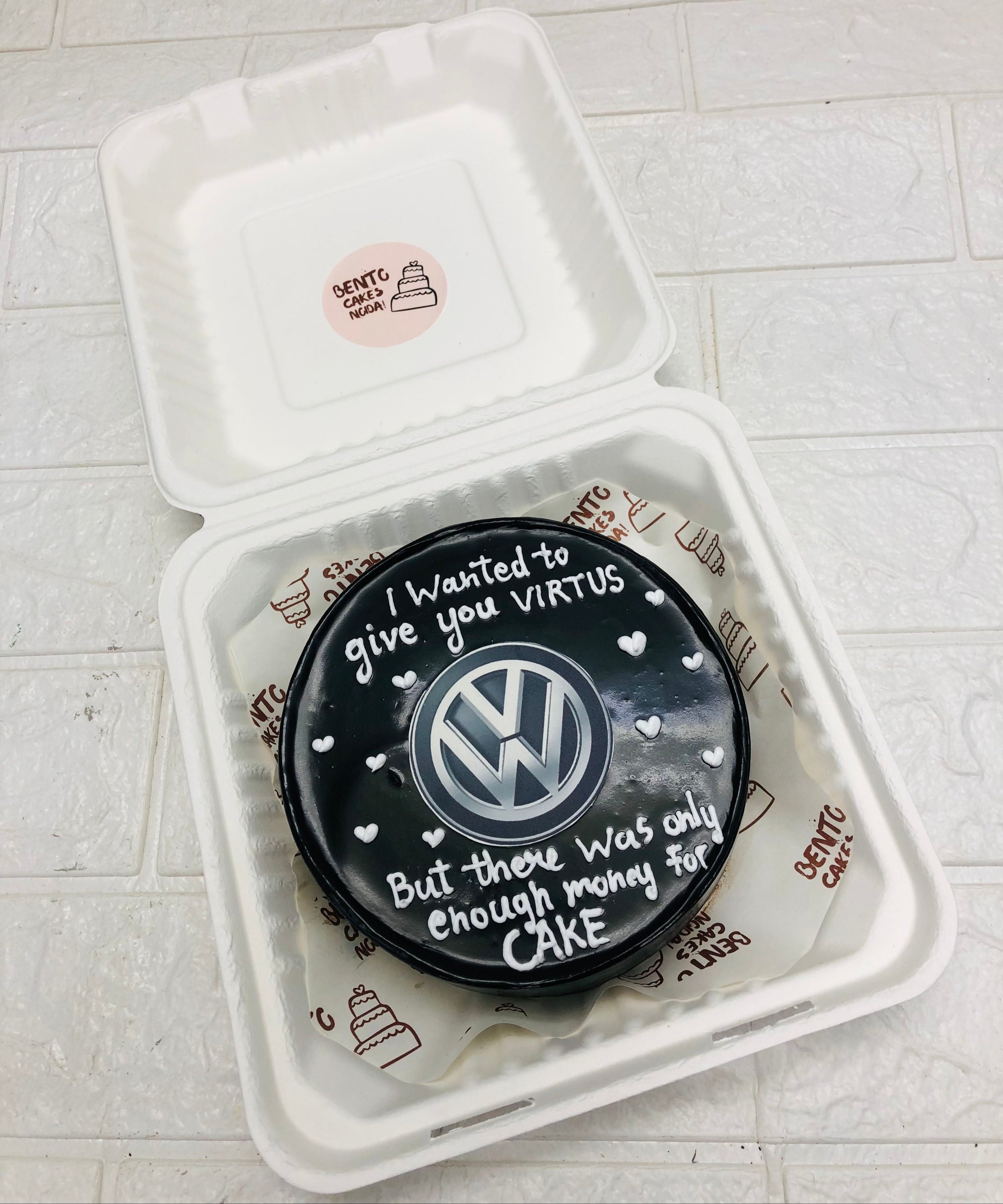 Chocolate black bento cake is designed for Volkswagen Car lovers birthday.