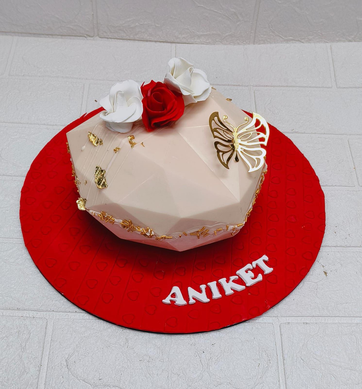 Pinata Cake with Roses & Gold Decor