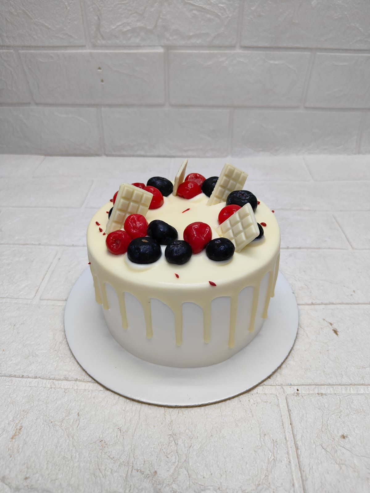 Berry Drip Delight cake