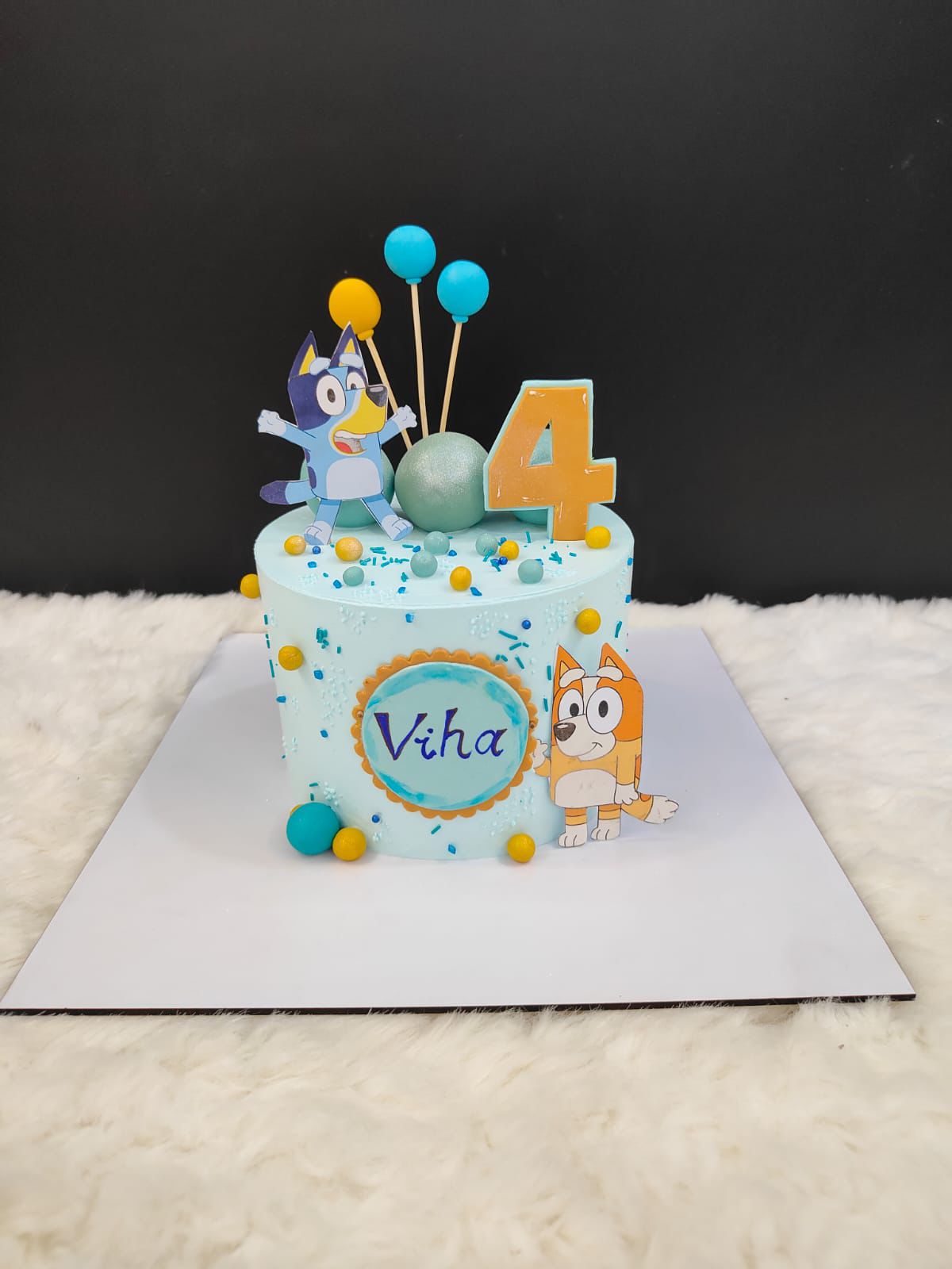 Blue & Yellow with Figurines cake