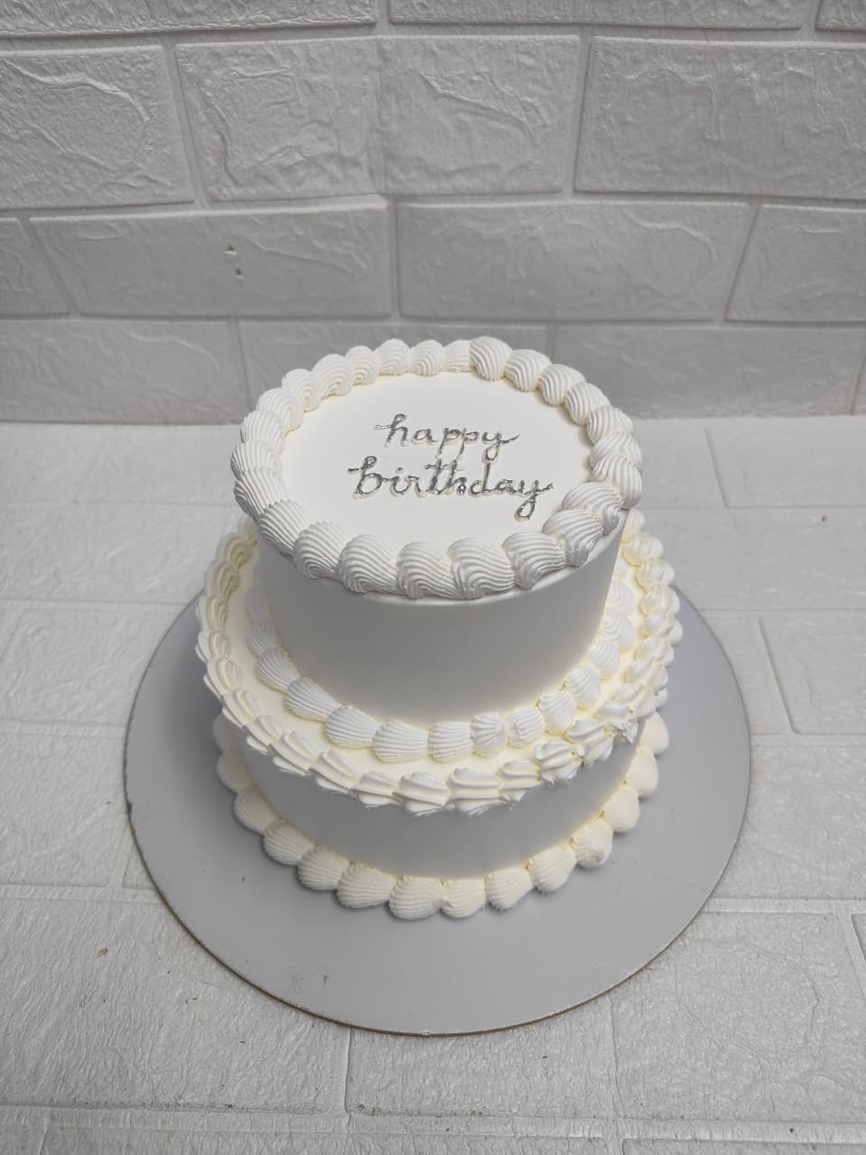 Two-Tier White Birthday Cake