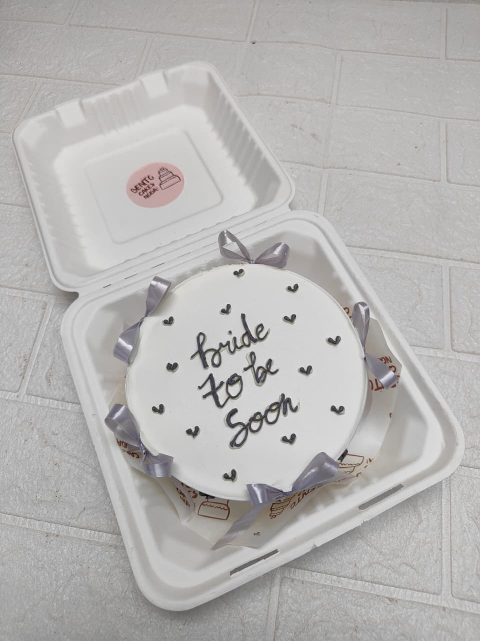 White with Black Hearts cake