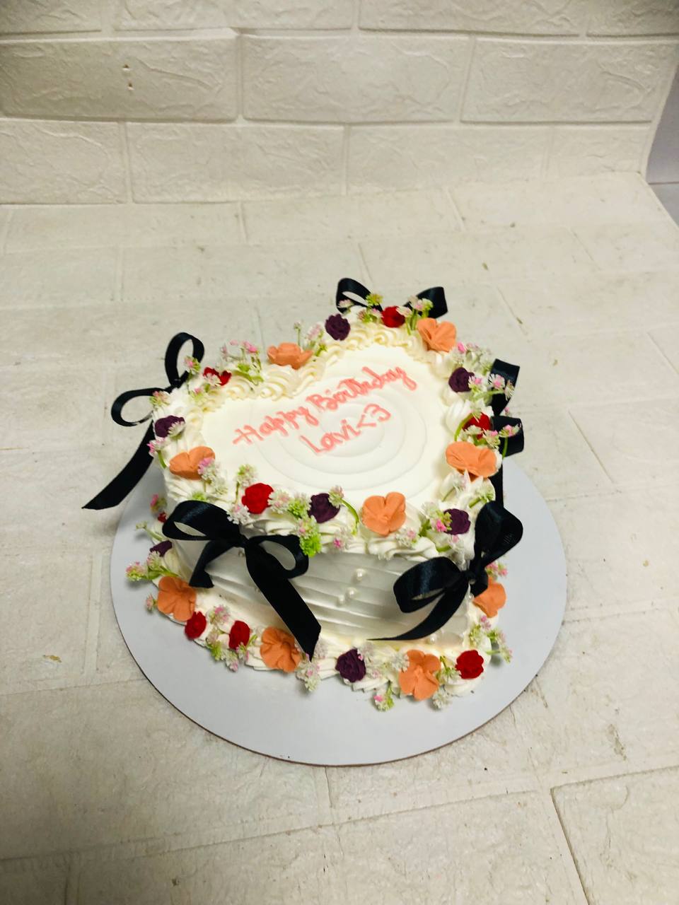 White Base with Colorful Flowers Heart Birthday Cake