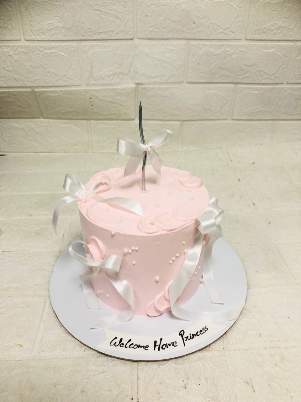 Pink with White Ribbon Bows Welcome Cake