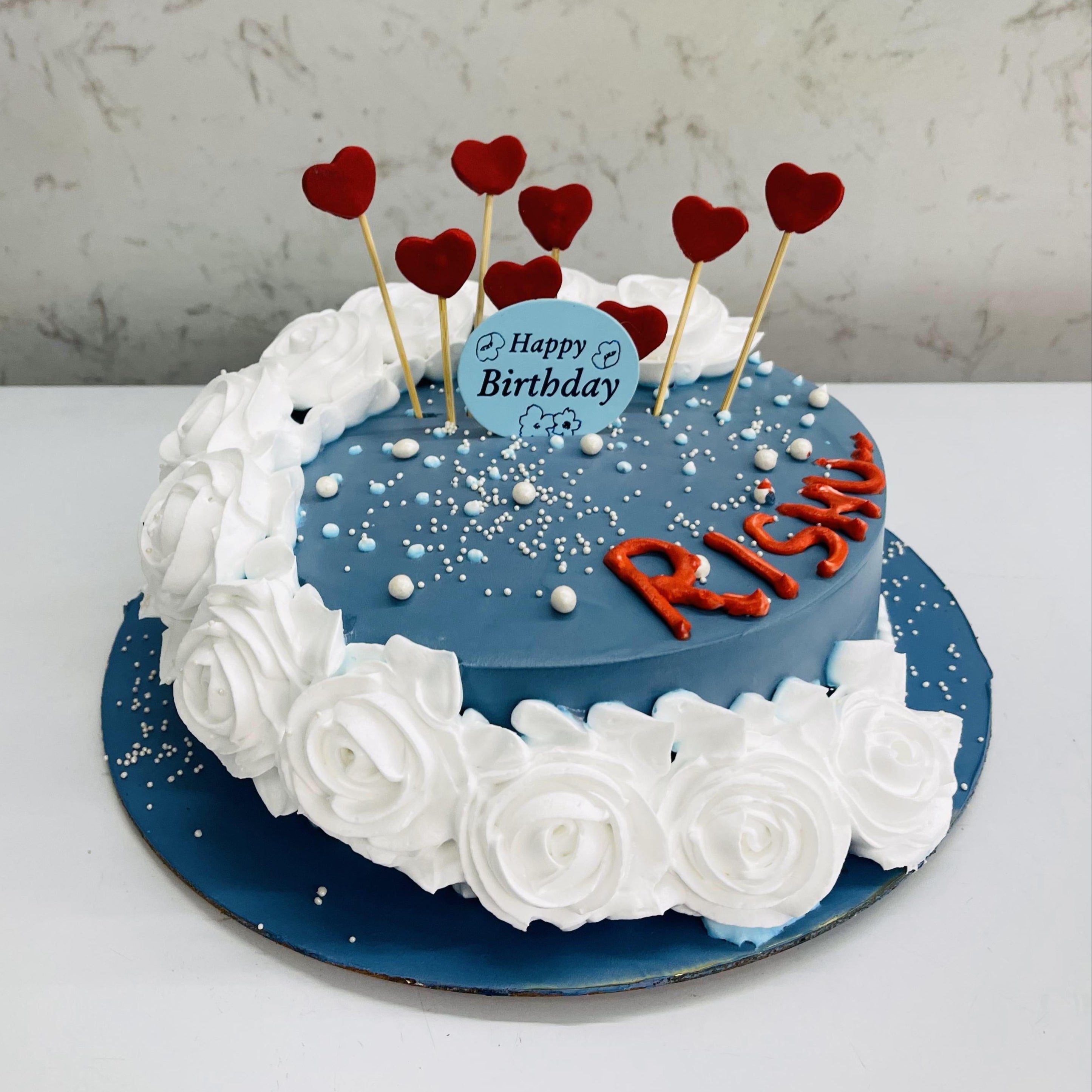 White Flowers Blue Cake With Hearts Design
