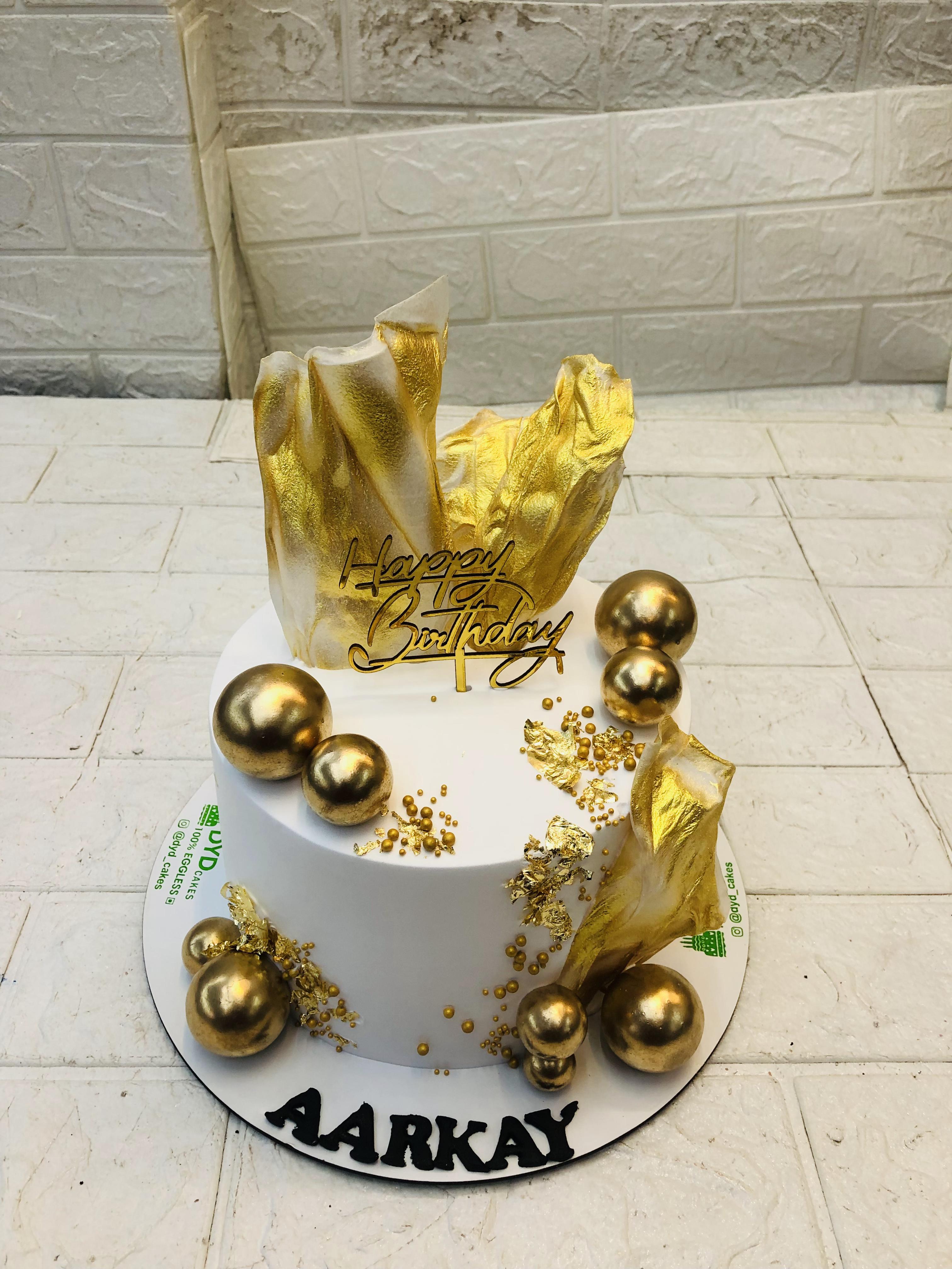 100% Eggless White and Gold Cake in Noida , Greater Noida, Delhi from DYD Cakes